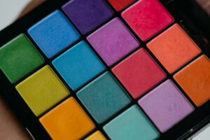 makeup palette, bold colors, makeup tools, makeup brushes, makeup remover, creative makeup application, glitter