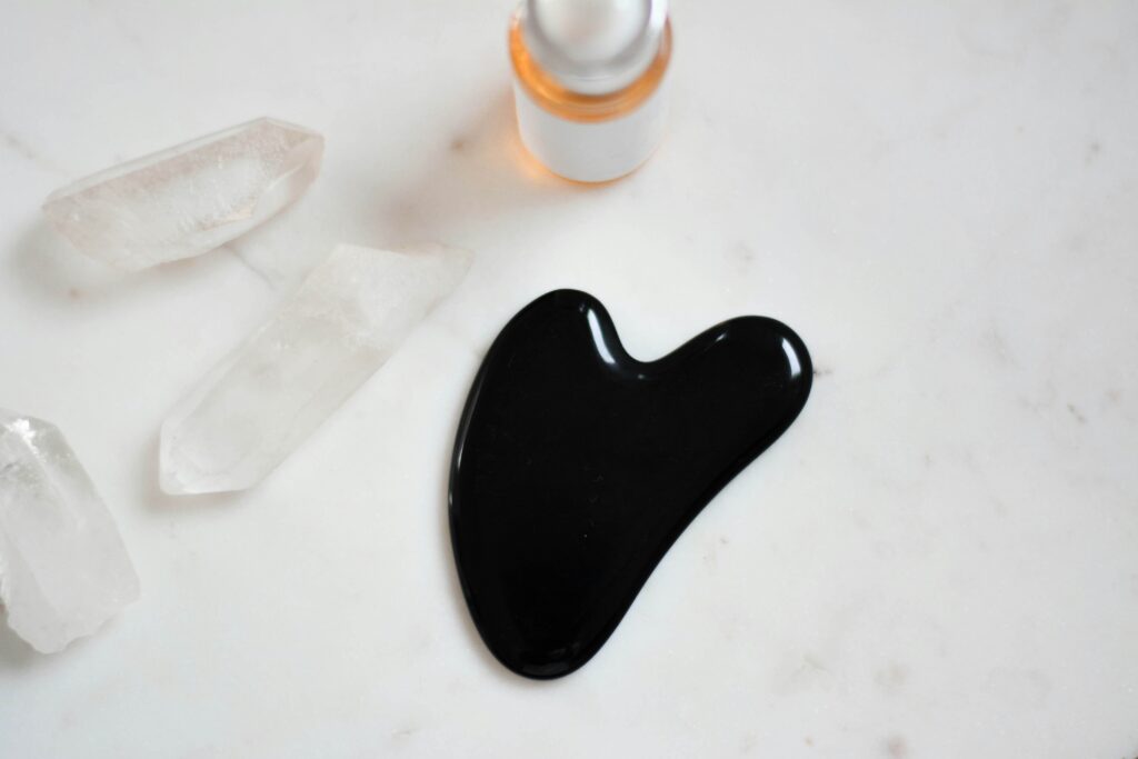 Gua sha, face oil