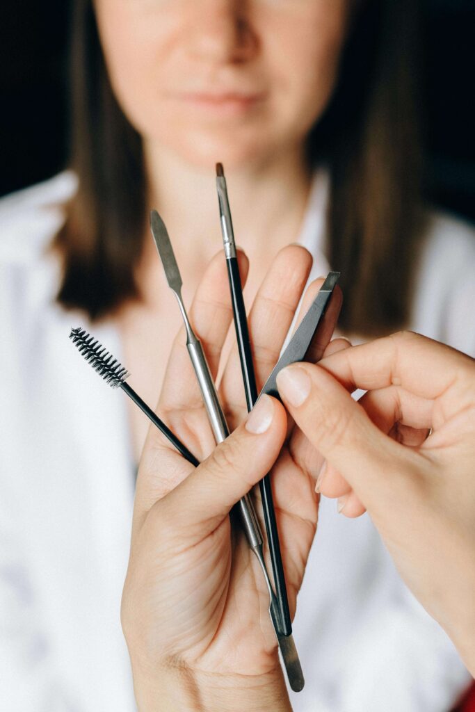 tweezers, brush